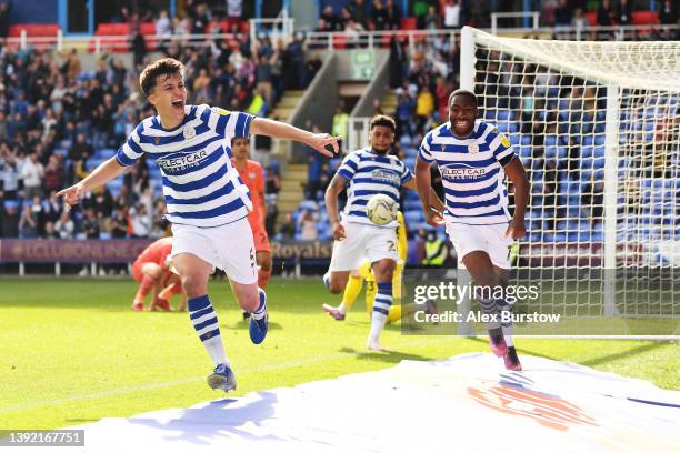 Tom McIntyre of Reading celebrates after scoring their team's fourth goal during the Sky Bet Championship match between Reading and Swansea City at...