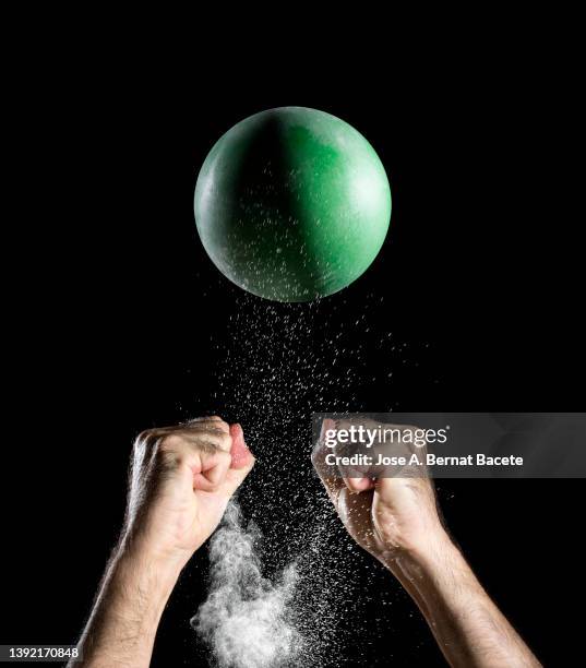 hands of a man playing sports with a ball. - ballon rebond stock pictures, royalty-free photos & images