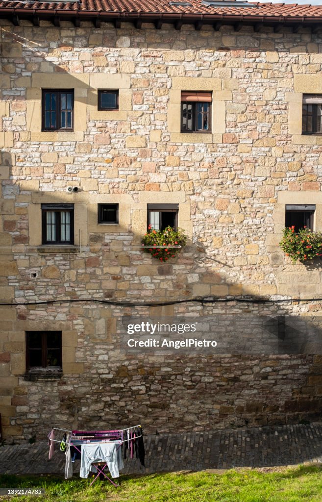 Laundry hanging outside a historic building -a bit of humor in everyday life