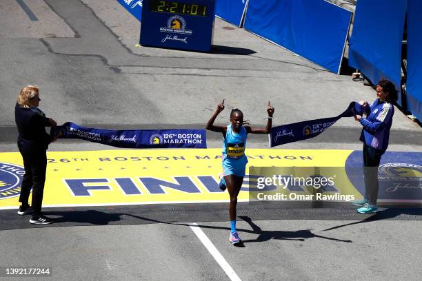 Peres Jepchirchir of Kenya crosses the finish line to take first place in the professional women's division during the 126th Boston Marathon on April...