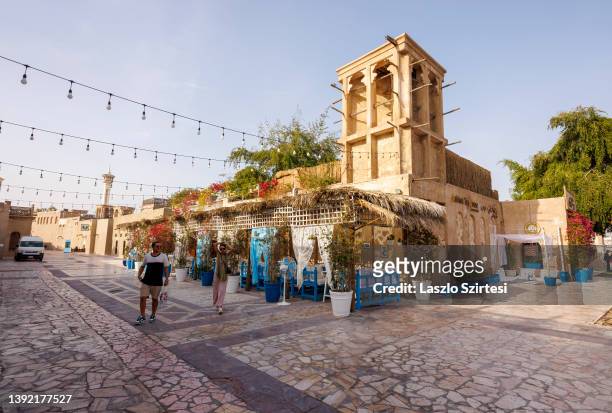 Visitors walk at the Old Town on April 9, 2022 in Dubai, United Arab Emirates.