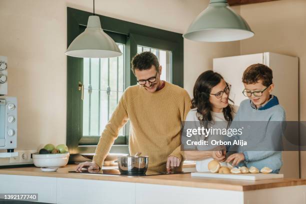 family cooking with his son - family wearing glasses stock pictures, royalty-free photos & images