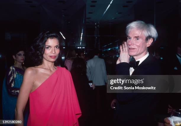 View of Nicaraguan actress & model Bianca Jagger and American Pop artist Andy Warhol as they attend an unspecified event, New York, New York, January...