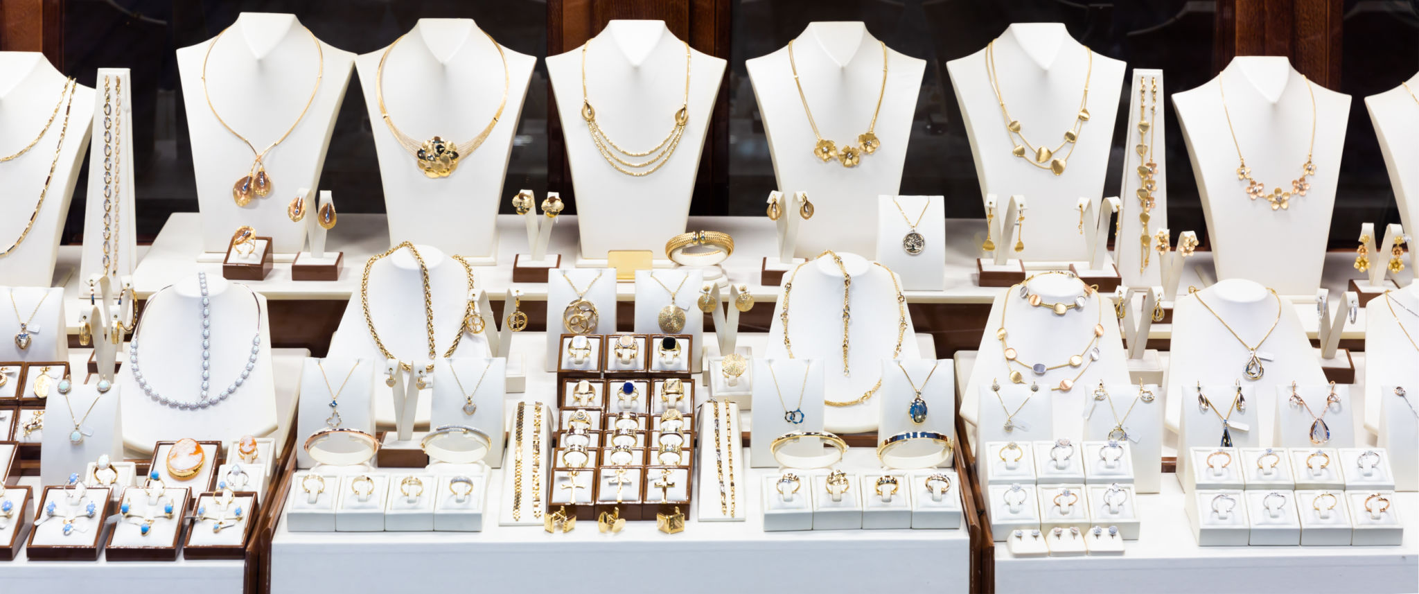 Pendants and bracelets with dimonds in jewelry store Pendants and bracelets with dimonds in jewelry store