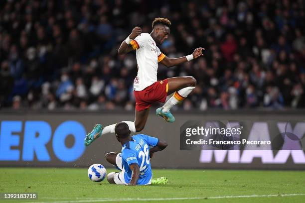 Tammy Abraham of AS Roma is challenged by Kalidou Koulibaly of Napoli during the Serie A match between SSC Napoli and AS Roma at Stadio Diego Armando...