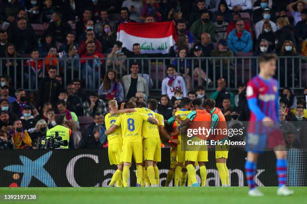 Lucas Perez of Cadiz celebrates scoring their side's first goal with teammates during the LaLiga Santander match between FC Barcelona and Cadiz CF at...