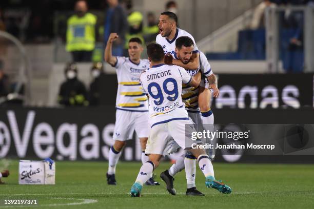 Federico Ceccherini of Hellas Verona celebrates with team mates after scoring to give the side a 1-0 lead during the Serie A match between Atalanta...