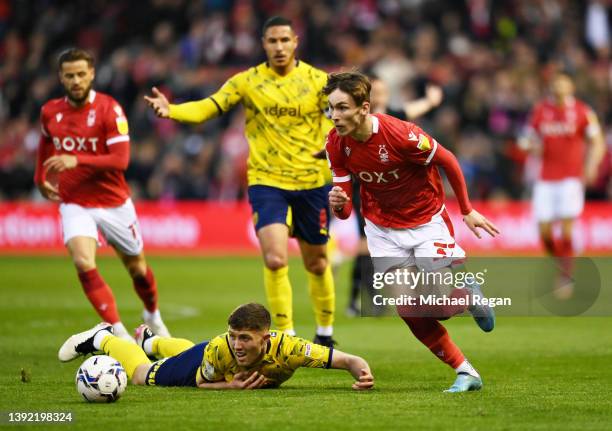 Dara O'Shea of West Bromwich Albion looks on as James Garner of Nottingham Forest runs with the ball during the Sky Bet Championship match between...