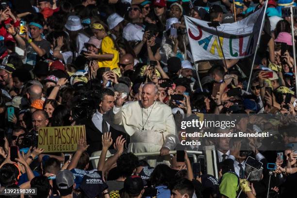 Pope Francis meets with Catholic teenagers in St Peter's Square at the Vatican, on April 18, 2022 in Vatican City, Vatican. About 80000 young people...