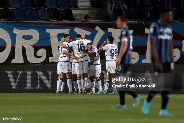 Ivan Ilic of Hellas Verona celebrates theirs sides second goal with teammates after Teun Koopmeiners of Atalanta concedes an own goal during the...