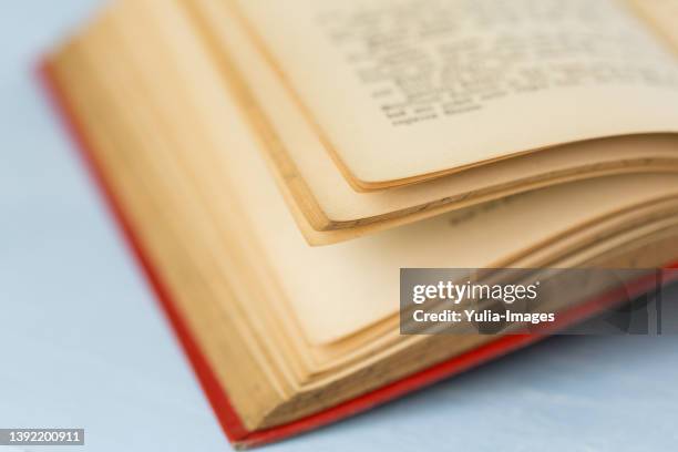 Open Book Red Color Open Book Red Background Photos and Premium High Res Pictures - Getty ...