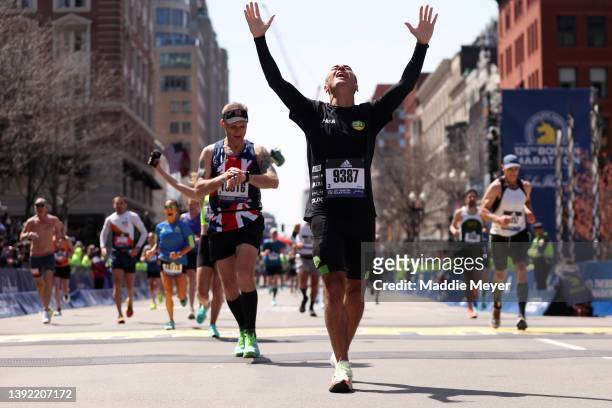 Rodrigo Ronzella celebrates after crossing the finish line during the 126th Boston Marathon on April 18, 2022 in Boston, Massachusetts.