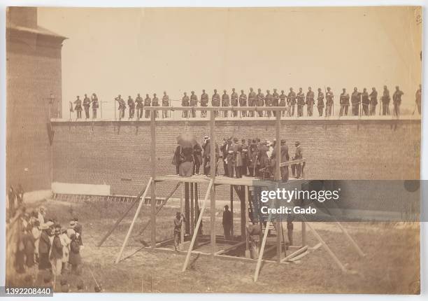 Execution of the conspirators who worked to assassinate President Abraham Lincoln at Washington Arsenal, 1865. Note: Image has been digitally...