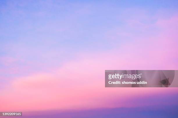 pink and purple colour sky at sunset - romantic sky stock pictures, royalty-free photos & images