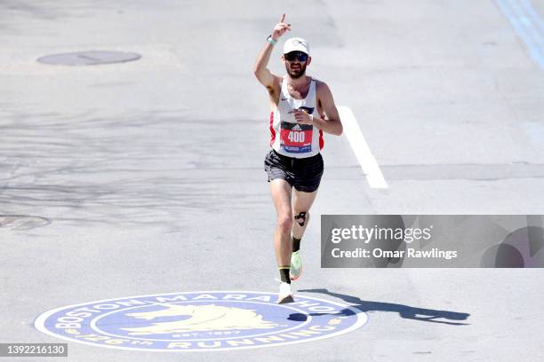 Runner makes their way down Boylston street to the finish line during the 126th Boston Marathon on April 18, 2022 in Boston, Massachusetts.