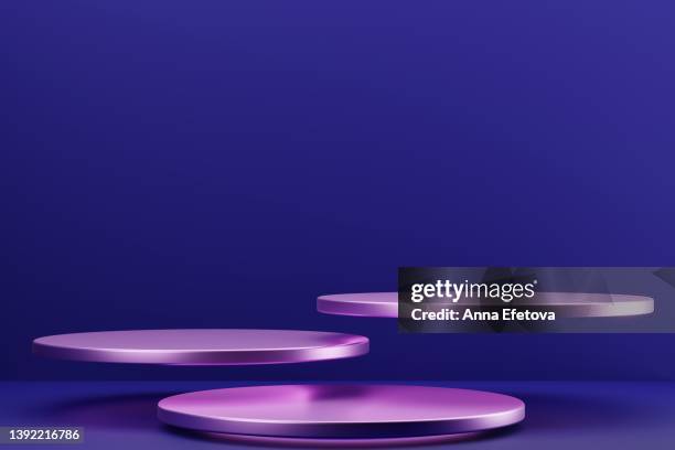 three violet podiums with violet neon lighting on purple background. empty place for your product presentation. demonstrating very peri - color of 2022 year - tre objekt bildbanksfoton och bilder