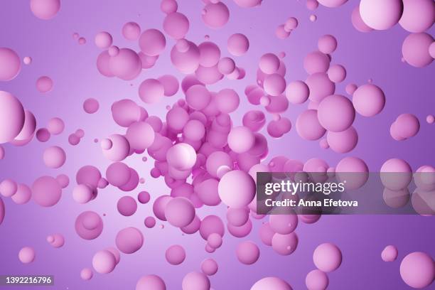 many violet 3d spheres on purple background. demonstrating very peri - color of 2022 year - 3d balls stock pictures, royalty-free photos & images