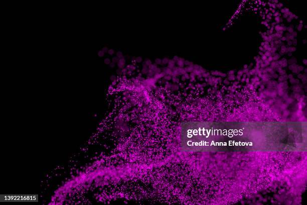 bright violet swirl of many little particles on black background. holiday backdrop for your design. three dimensional illustration. demonstrating very peri - color of 2022 year - colored powder stock pictures, royalty-free photos & images