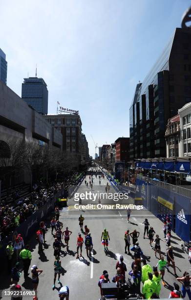 Runnings make their way down Boylston street to the finish line during the 126th Boston Marathon on April 18, 2022 in Boston, Massachusetts.