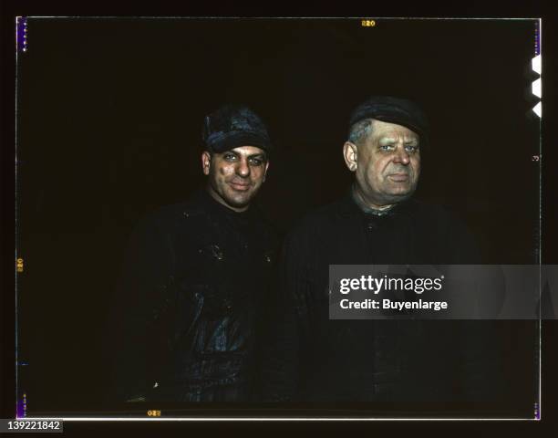Two employees at the roundhouse at the Chicago & Northwestern Railroad's Proviso yard, Chicago, Illinois, 1942.