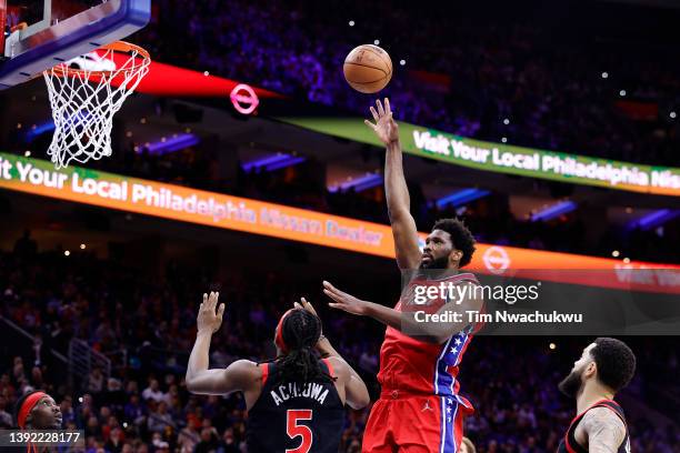 Joel Embiid of the Philadelphia 76ers shoots over Precious Achiuwa of the Toronto Raptors during the first quarter of Game Two of the Eastern...