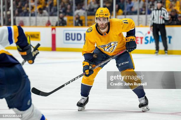 Luke Kunin of the Nashville Predators skates against the St. Louis Blues during an NHL game at Bridgestone Arena on April 17, 2022 in Nashville,...