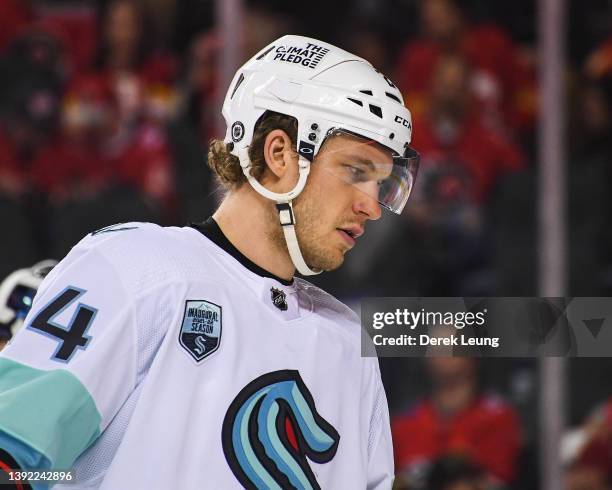 Jamie Oleksiak of the Seattle Kraken in action against the Calgary Flames during an NHL game at Scotiabank Saddledome on April 12, 2022 in Calgary,...