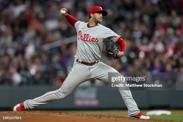 Starting pitcher Aaron Nola of the Philadelphia Phillies throws against the Colorado Rockies in the fourth inning at Coors Field on April 18, 2022 in...