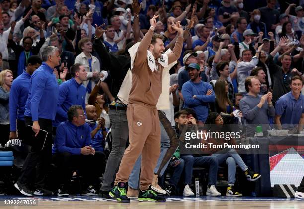Luka Doncic of the Dallas Mavericks reacts as the Dallas Mavericks take the lead against the Utah Jazz late in the fourth quarter of Game Two of the...