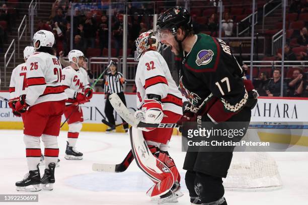 Alex Galchenyuk of the Arizona Coyotes celebrates after scoring a goal against goaltender Antti Raanta of the Carolina Hurricanes during the second...