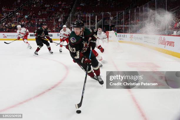 Nathan Smith of the Arizona Coyotes skates with the puck during the second period of the NHL game against the Carolina Hurricanes at Gila River Arena...