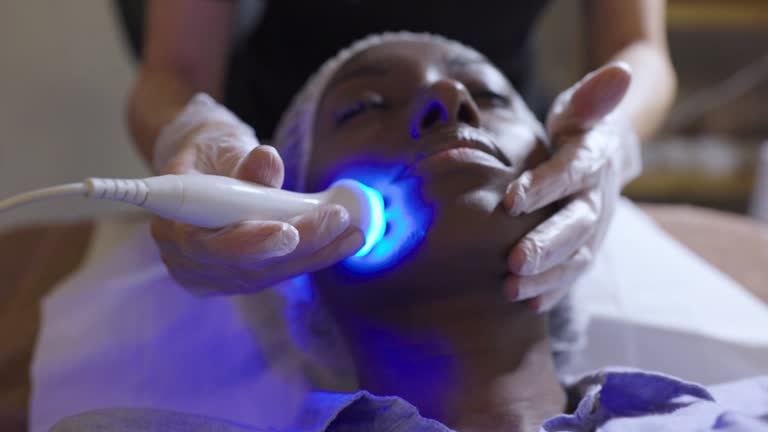 https://media.gettyimages.com/id/1392256747/video/african-american-woman-at-the-spa-getting-a-rejuvenation-treatment-on-her-face-using.jpg?b=1&s=640x640&k=20&c=bP8F9SQjpPuWJdHuOWaHLHff1xfWqbL0hsY9-yOUF7M=