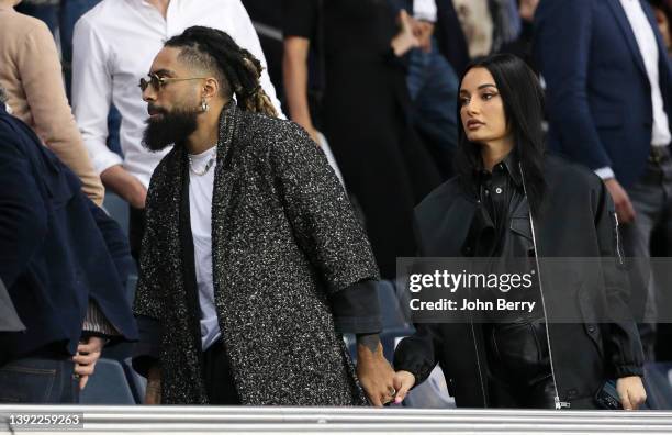 Fary Lopes and his girlfriend Amina Muaddi attend the Ligue 1 Uber Eats match between Paris Saint-Germain and Olympique de Marseille at Parc des...