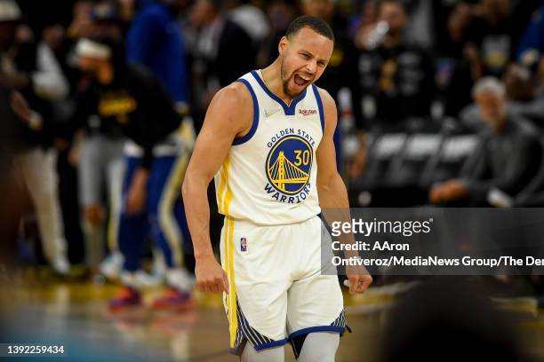 Stephen Curry of the Golden State Warriors celebrates cooking the Denver Nuggets during the third quarter at Chase Center on Monday, April 18, 2022.