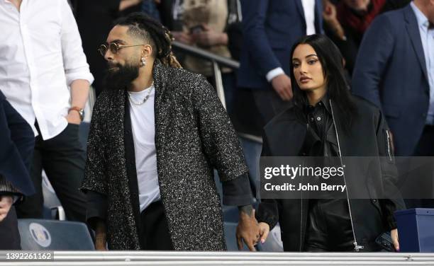 Fary Lopes and his girlfriend Amina Muaddi attend the Ligue 1 Uber Eats match between Paris Saint-Germain and Olympique de Marseille at Parc des...