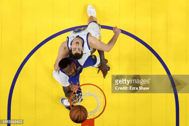 JaMychal Green of the Denver Nuggets and Nemanja Bjelica of the Golden State Warriors go for a rebound during Game Two of the Western Conference...