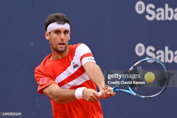 Carlos Taberner of Spain plays a two-handed backhand in their first round match against Sebastian Korda of United States during Day Two of Barcelona...