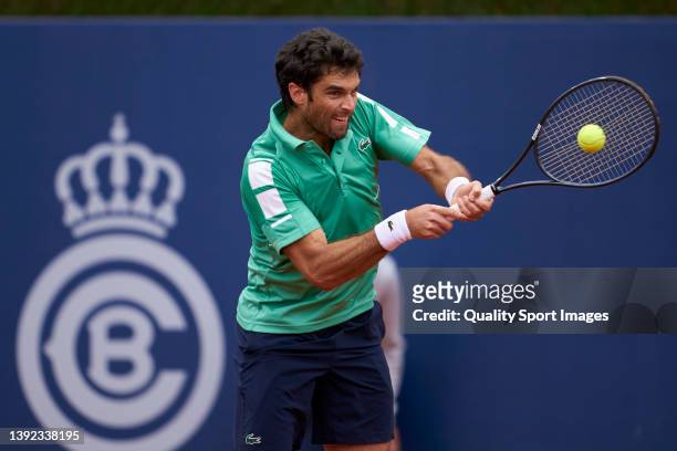 Pablo Andujar of Spain plays a backhand against Ugo Humbert of France during day two of the Barcelona Open Banc Sabadell at Real Club De Tenis...