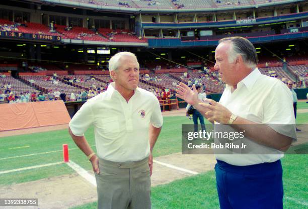 San Francisco 49'ers Head Coach Bill Walsh speaks with Los Angeles Rams Head Coach John Robinson before Rams v 49'ers game, September 14, 1986 in...