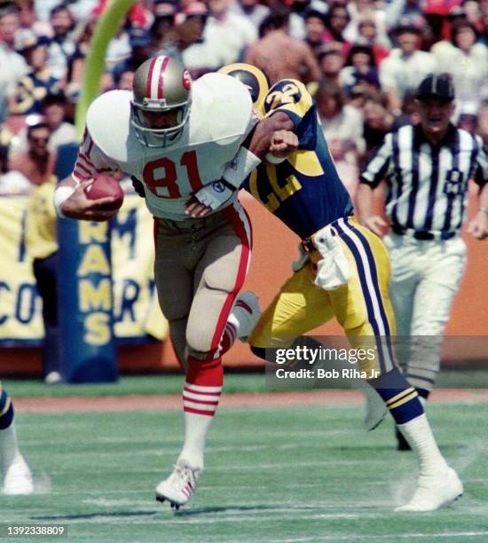 San Francisco 49'ers TE Russ Francis runs after reception during game action during Los Angeles Rams v San Francisco 49'ers game, September 14, 1986...