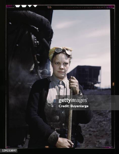 Woman employed at the roundhouse as a wiper, Clinton, Iowa, 1943.