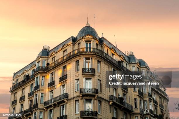 distinctive architecture in buenos aires, argentina, during sunset. low viewpoint. this architecture is also very reminiscent of barcelona and paris. - buenos aires rooftop stock pictures, royalty-free photos & images