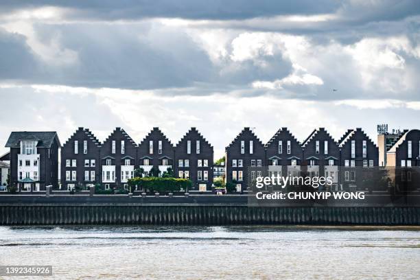 flats in downtown, london - modern housing development uk stock pictures, royalty-free photos & images