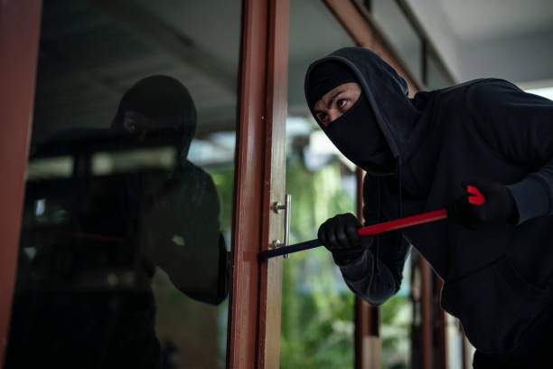 Robber Breaking In 59 Burglar Entering Room Stock Photos, High-Res Pictures, and Images ...