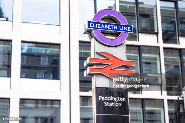 elizabeth line crossrail and british rail signs at paddington station in london - paddington railway station stock pictures, royalty-free photos & images