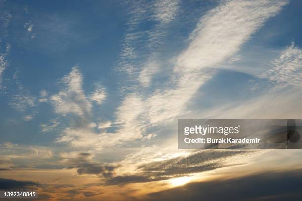 beautiful clouds illuminated by sunrise. sky background - 巻雲 ストックフォトと画像