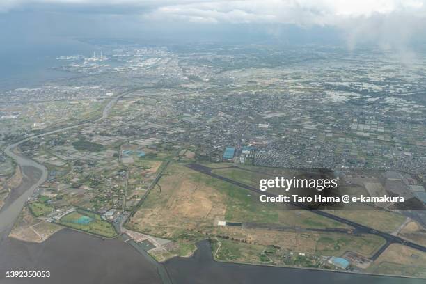 kisarazu city in chiba of japan aerial view from airplane - chiba city stock-fotos und bilder