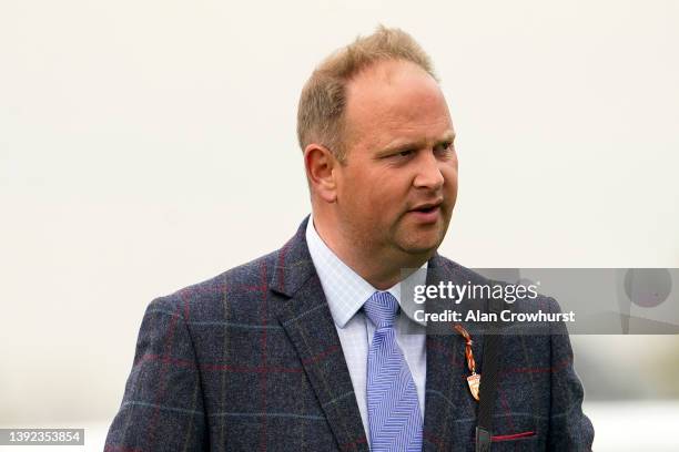 David Menuisier poses at Epsom Racecourse on April 19, 2022 in Epsom, England.