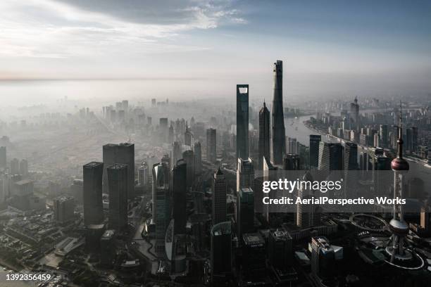 aerial view of shanghai skyline - world financial centre stock pictures, royalty-free photos & images