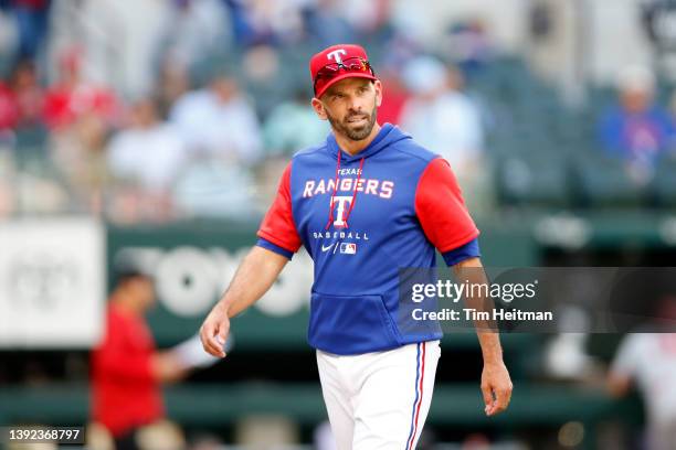 Chris Woodward of the Texas Rangers walks off the field in the game against the Los Angeles Angels at Globe Life Field on April 17, 2022 in...